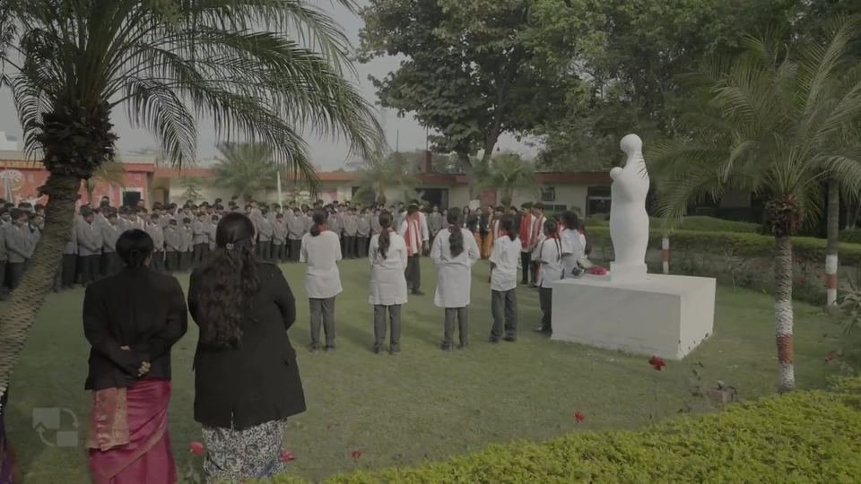 Students at morning assembly on the lawn at Dalimss Sunbeam, Rohania