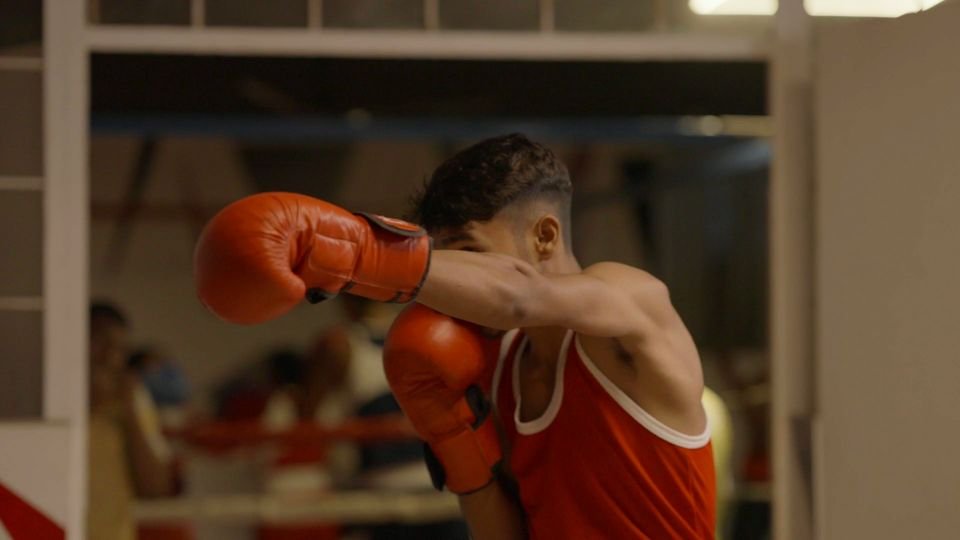 Boxing training in the school gym at Rohania
